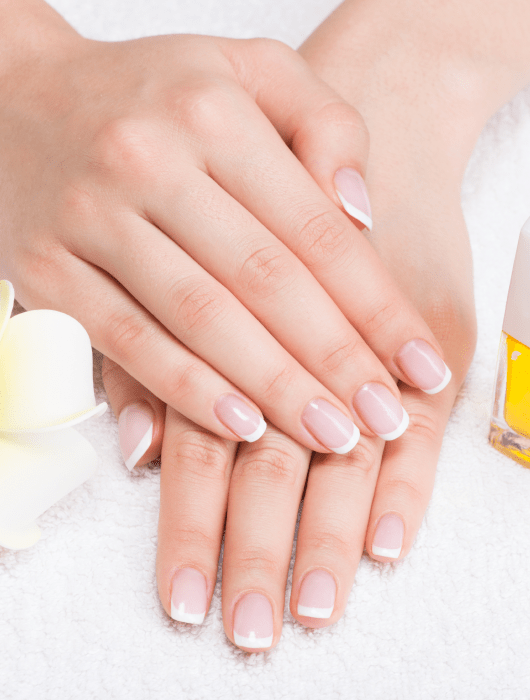 woman nail salon receiving manicure by beautician beauty treatment concept 2 min